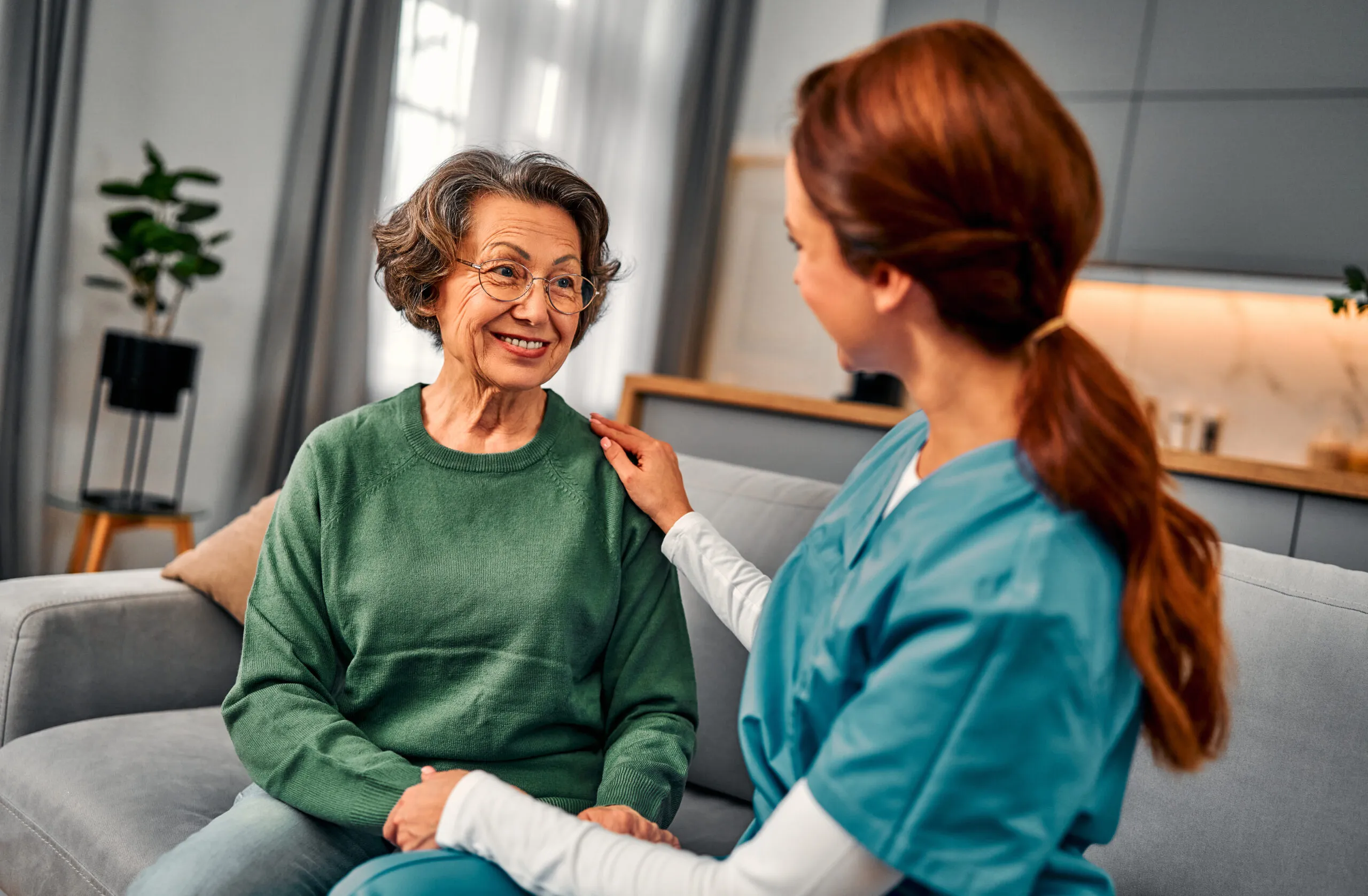Private in home nursing care Dundee MI nurse assisting senior with medication management and compassionate home care nursing Dundee MI